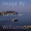 GW14465-50 = Superyachts Libertad + Liberty at anchor at early morning + passing tour boat in the Bay of Santa Ponsa, Calvia, Mallorca, Balearic Islands, Spain.