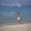 GW16730-50 = Beach scene ( girl jogging ) at Es Trenc (Platja de Trenc), SE Mallorca, Baleares, Spain.