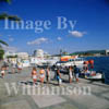 GW05190-32 = Promenade scene (with ferry boats to beaches around the bay in San Antonio, Ibiza, Baleares, Spain. 1998.