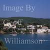 GW20985-50 = Scene (looking North) with sailing boat and water side villas in the approaches to the Port of Mahon, Menorca, Baleares, Spain. 