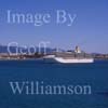 GW21110-50 = P&O Line flagship cruise liner Arcadia entering the Port of Palma de Mallorca ( past the famous gothic cathedral ) during her inaugural cruise, Palma de Mallorca, Balearic Islands, Spain. 25th April 2005. 
