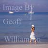 GW22730-50  = Young lady enjoying the sun and sea on Es Trenc beach ( Playa Es Trenc ), SE Mallorca, Balearic Islands, Spain.GW22730-50