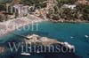 GW24568-50 = Aerial image ( with beach, bay, island restaurant and pleasure craft ) of Camp de Mar, Andratx, SW Mallorca, Balearic Islands, Spain.