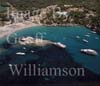 GW24569-50 = Aerial image ( with beach, bay, island restaurant and pleasure craft ) of Camp de Mar, Andratx, SW Mallorca, Balearic Islands, Spain.