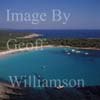 GW28055-60 = Aerial view looking East - large remote cala / bay with long sandy beach and leisure craft at anchor - South Coast Menorca, Balearic Islands, Spain. 20th September 2006. 