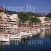 GW29810-60 = Scene in Puerto Soller marina - moored traditional Mallorquin wooden llauts and promenade - North Mallorca, Balearic Islands, Spain. 15th July 2007.