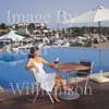 GW30175-60 = Scene at Cala D'Or Yacht Club - poolside drink - overlooking Marina of Cala D'Or, Cala D'Or, Ajuntamiento de Santanyi, South East Mallorca, Balearic Islands, Spain. 11th September 2007. Model Release.