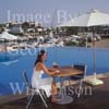 GW30190-60 = Scene at Cala D'Or Yacht Club - poolside drink - overlooking Marina of Cala D'Or, Cala D'Or, Ajuntamiento de Santanyi, South East Mallorca, Balearic Islands, Spain. 11th September 2007. Model Release.