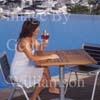 GW30195-60 = Scene at Cala D'Or Yacht Club - poolside drink - overlooking Marina of Cala D'Or, Cala D'Or, Ajuntamiento de Santanyi, South East Mallorca, Balearic Islands, Spain. 11th September 2007. Model Release.