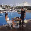 GW30205-60 = Scene at Cala D'Or Yacht Club - delicious poolside snack - overlooking Marina of Cala D'Or, Cala D'Or, Ajuntamiento de Santanyi, South East Mallorca, Balearic Islands, Spain. 11th September 2007. Model Release.