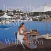GW30220-60 = Scene at Cala D'Or Yacht Club - delicious poolside snack - overlooking Marina of Cala D'Or, Cala D'Or, Ajuntamiento de Santanyi, South East Mallorca, Balearic Islands, Spain. 11th September 2007. Model Release.