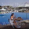 GW30225-60 = Scene at Cala D'Or Yacht Club - delicious poolside snack - overlooking Marina of Cala D'Or, Cala D'Or, Ajuntamiento de Santanyi, South East Mallorca, Balearic Islands, Spain. 11th September 2007. Model Release.