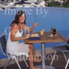 GW30230-60 = Scene at Cala D'Or Yacht Club - delicious poolside snack - overlooking Marina of Cala D'Or, Cala D'Or, Ajuntamiento de Santanyi, South East Mallorca, Balearic Islands, Spain. 11th September 2007. Model Release.