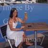 GW30245-60 = Scene at Cala D'Or Yacht Club - enjoying an ice cool poolside beer - overlooking Cala D'Or marina, Cala D'Or, Ajuntamiento de Santanyi, South East Mallorca, Balearic Islands, Spain. 11th September 2007. Model Release.