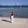 GW31815-60 = Professional Tai Chi and Kong Fu Instructor working out on a beach in Mallorca, Spain.