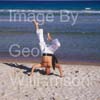 GW32130-60 = Professional Tai Chi and Kong Fu Instructor working out on a beach in Mallorca, Spain.
