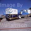 GW13735-50 = Scene at Palma de Mallorca Airport ( Tui / Hapag-Lloyd Boeing 737-800 Registration D-AHFY loading inflight catering and connected to pier services - power and waste disposal ), Baleares, Spain. 
