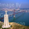 GW02980 = Aerial view of 100m high Statue of Christ the King looking towards Ponte 25 de Abril (1966 built bridge), River Targus and Belem district of Lisbon, Portugal. Sep 1997. 
