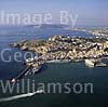 GW02470 = Aerial view over Ibiza Town and port with Formentera ferry + Windstar Sailing Cruise liner, Ibiza, Baleares, Spain. 28 Sep 1996. 